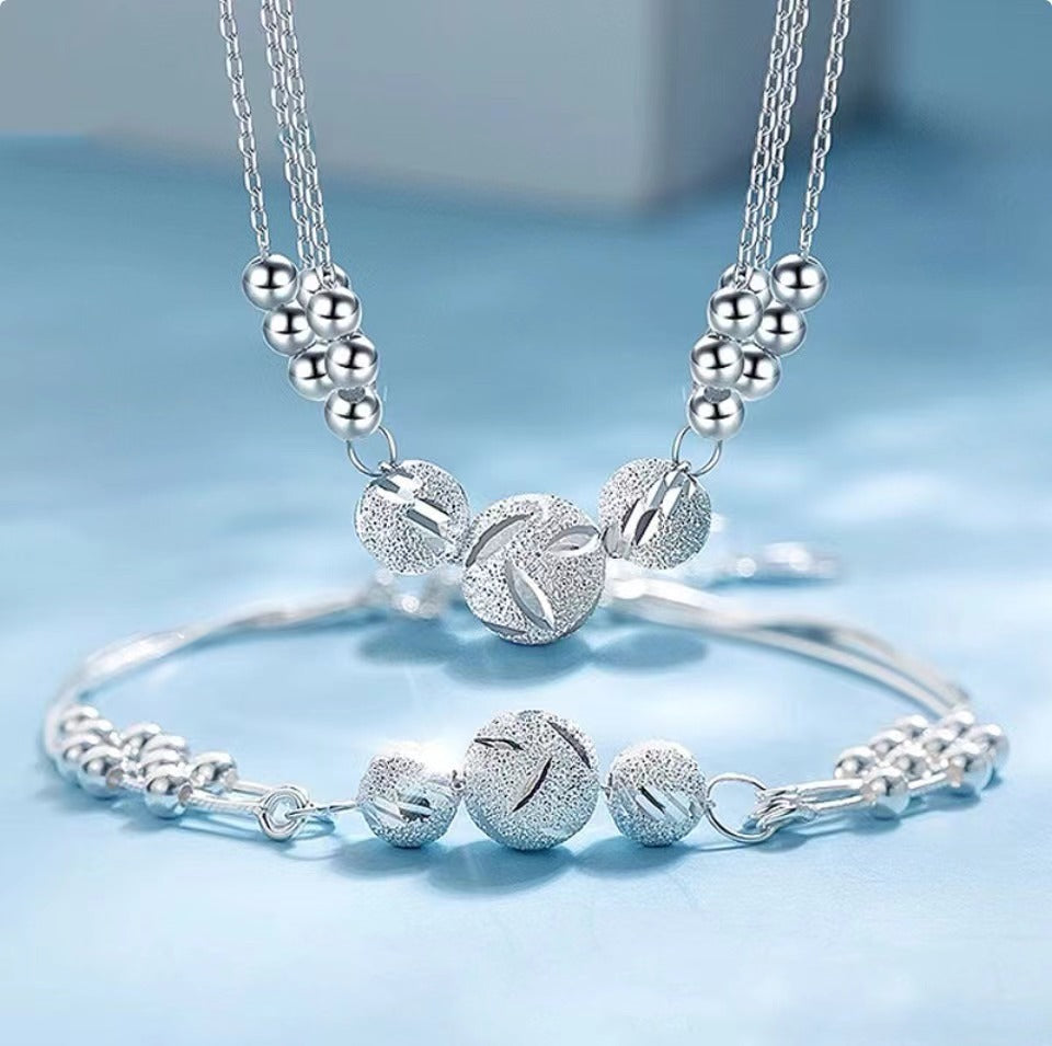 🔥【Kúp jeden, kamarát zdarma】🔥✨Ľahký a luxusný náhrdelník + náramok so šťastnými korálkami