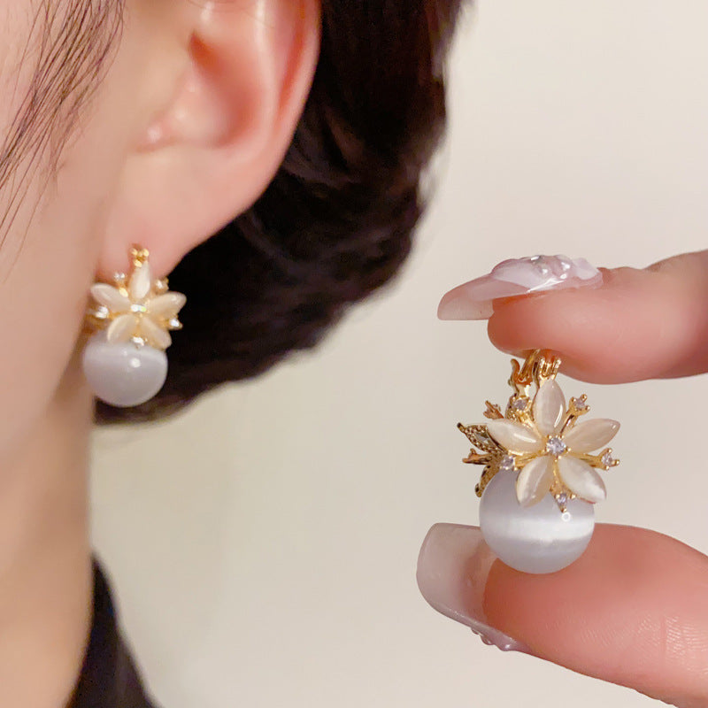 ⏰【Compra 1 y llévate 2 gratis】✨Pendientes de ojo de gato con flor de doble cara y circonita