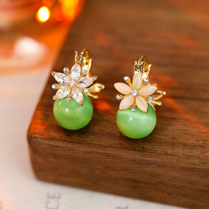 ⏰【Compra 1 y llévate 2 gratis】✨Pendientes de ojo de gato con flor de doble cara y circonita