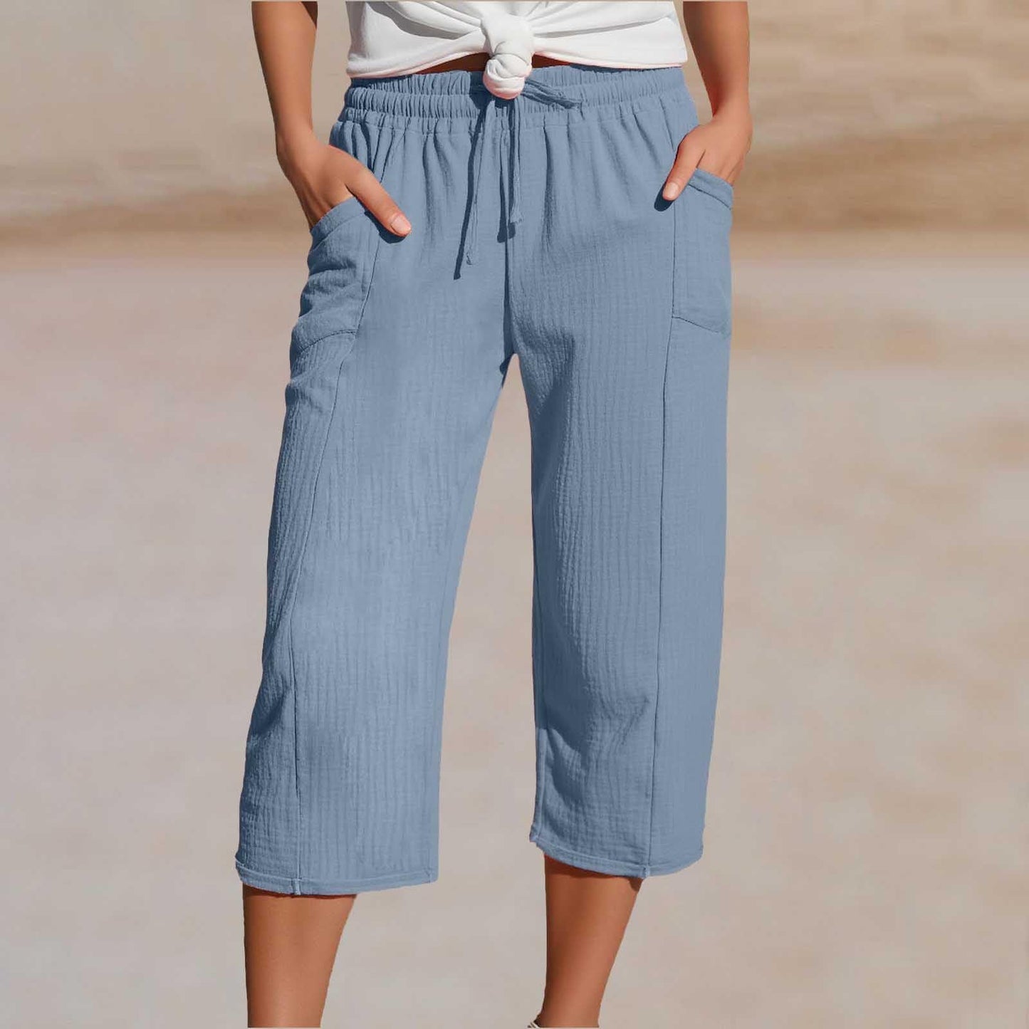🌺【Kupi 1, dobi 1 gratis】👖Ženske jednobojne plisirane capri hlače od pamuka i lana - hladne i prozračne, laskaju obliku nogu