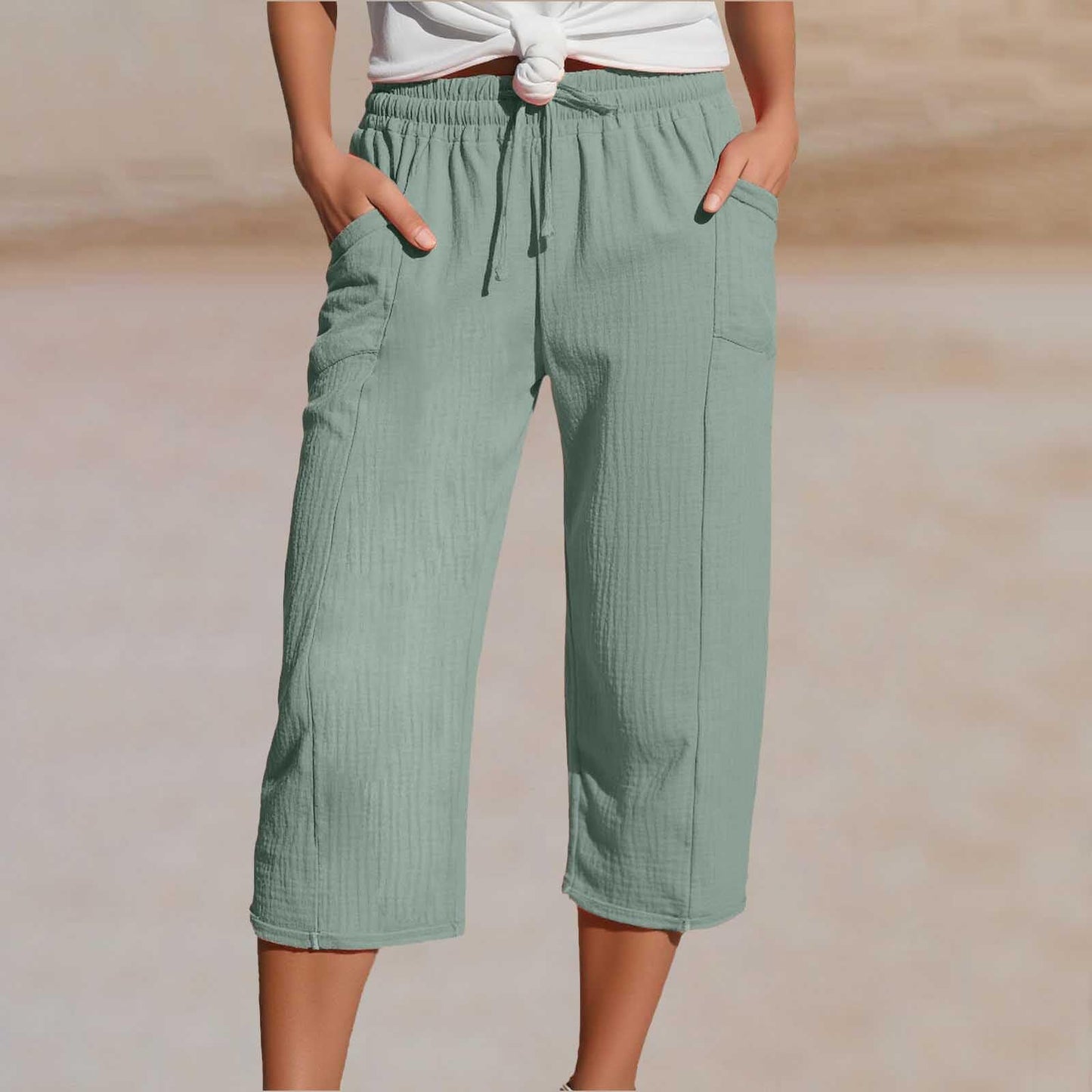 🌺【Kupi 1, dobi 1 gratis】👖Ženske jednobojne plisirane capri hlače od pamuka i lana - hladne i prozračne, laskaju obliku nogu